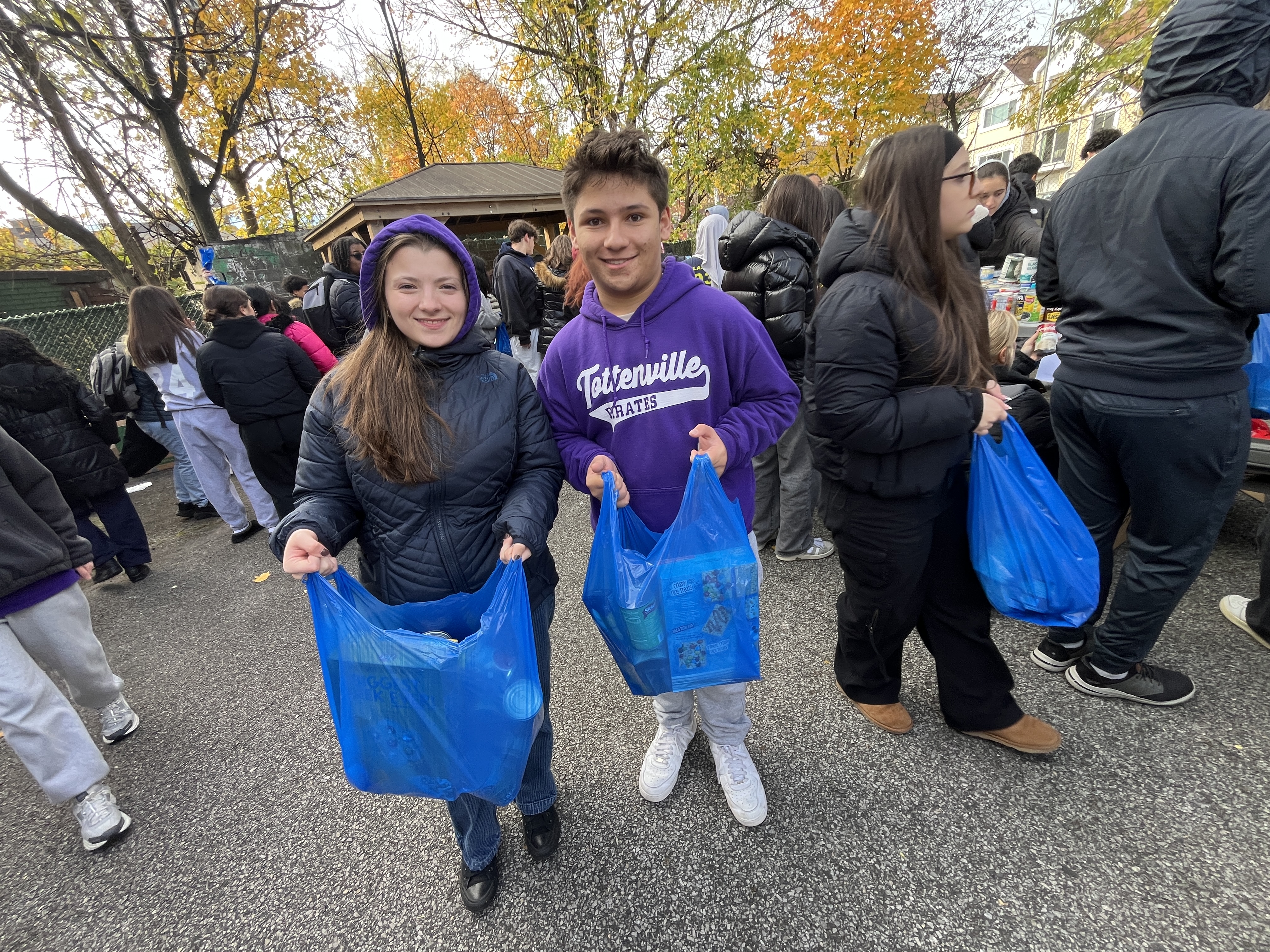 Student volunteers Hailey Ward a Tottenville HS senior and Matthew Cardillo a Tottenville HS sophomore. Ward says, ÒI am here today to help those who are struggling and help the get food and make sure their families are fed.Ó (Advance/SILive.com | Jan Somma-Hammel)