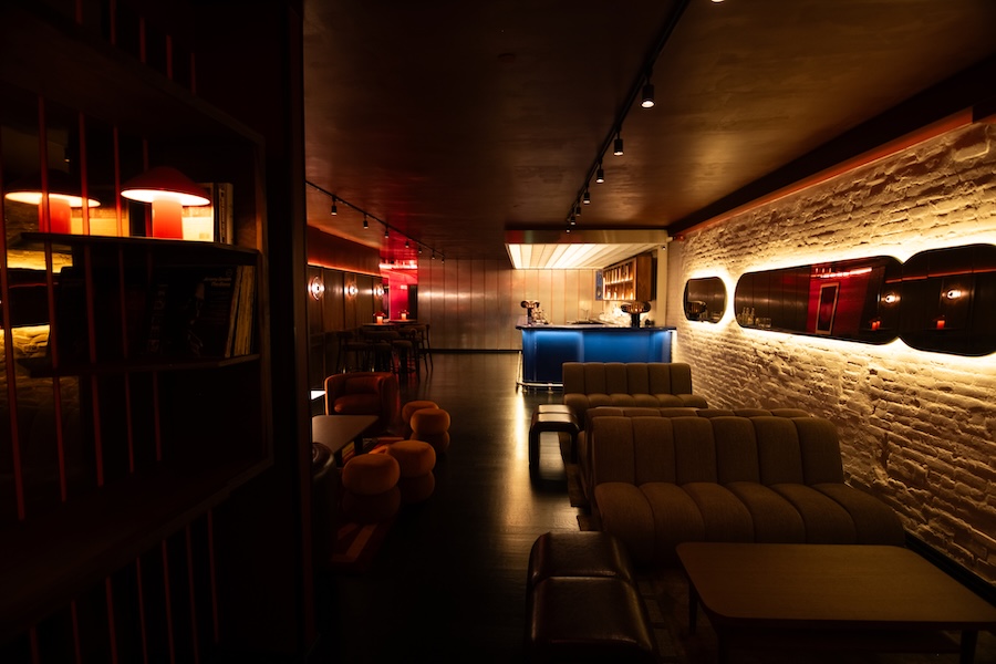 beatbox karaoke venue lounge new york exposed brick wall blue bar backlight