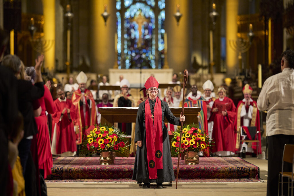 The newly-installed Bishop Katrina Foster greets the gathering at the Cathedral of St. John the Divine. Photo credit: Bob Williams