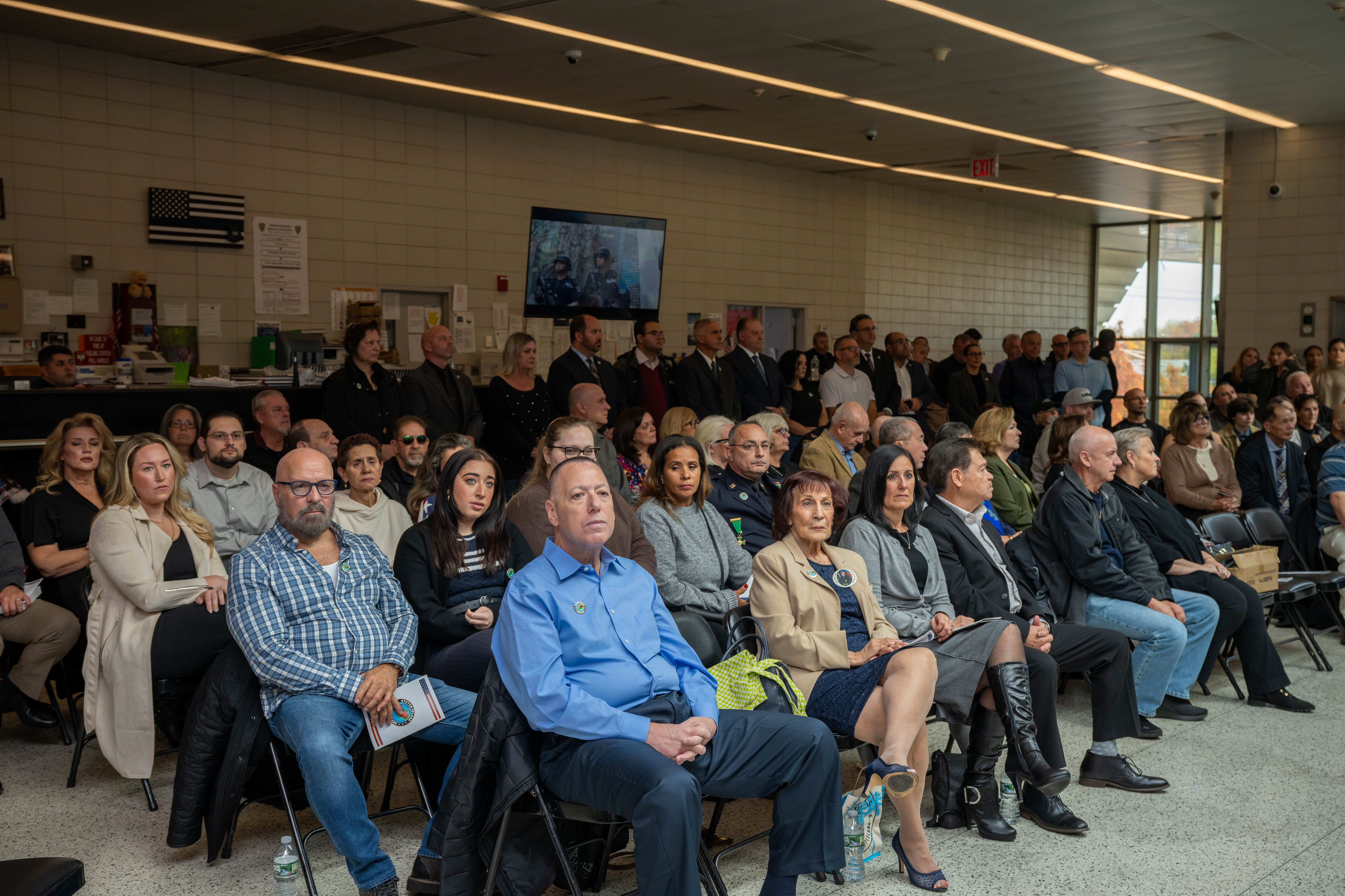 Friends, family, community leaders, elected officials, and fellow NYPD members gather at the 121st Precinct on Saturday, November 15, 2025, in Graniteville for the 10th annual Staten Island Remembers, honoring fallen Staten Islanders who served in the New York Police Department. (Owen Reiter for the Advance/SILive.com)