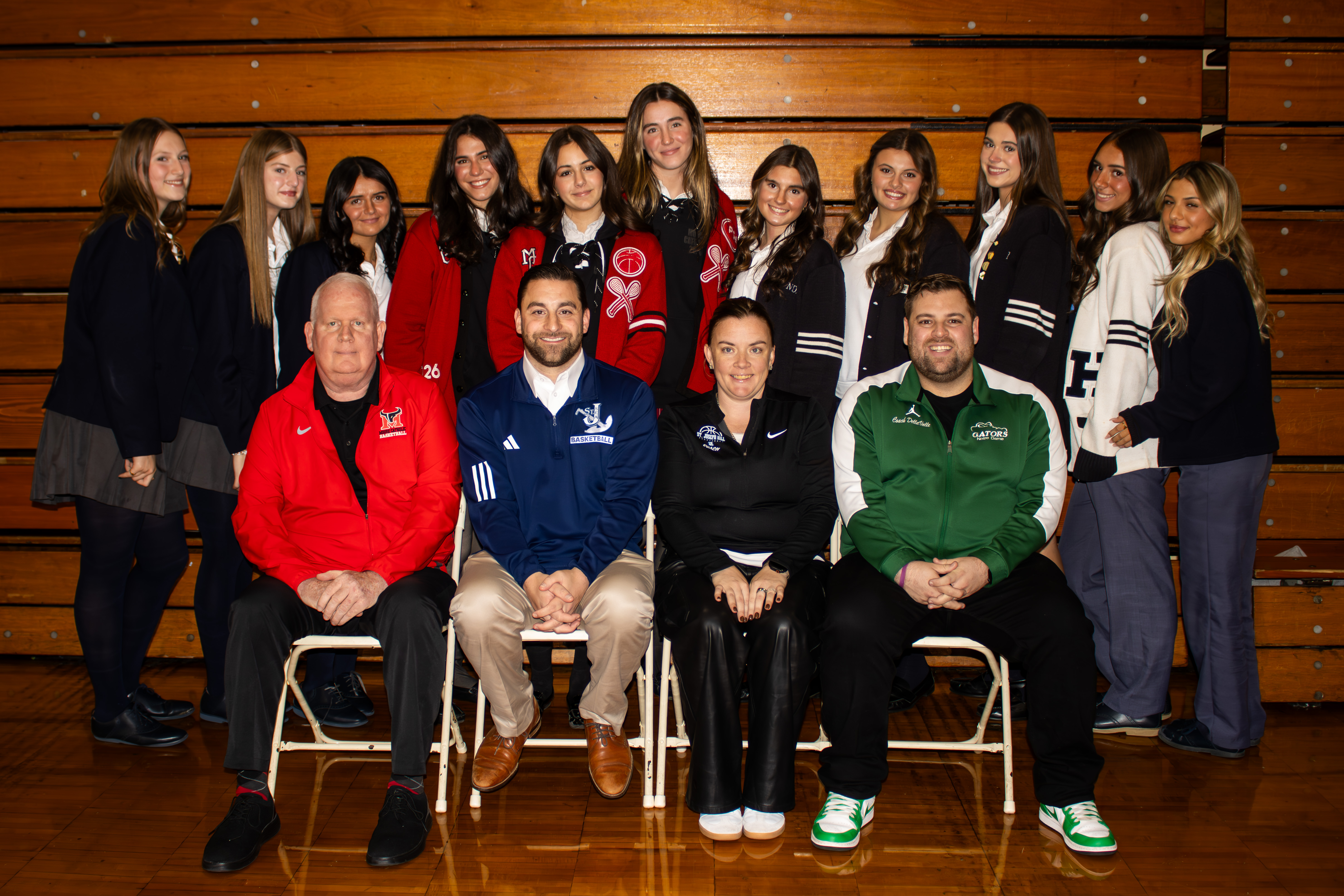All four Staten Island CHSAA schools, alongside 26 other teams across the league, took part in the second annual event at Christ the King Monday evening. Hill, Moore, NDA and Sea's head coaches and players smile for a photo. (Annie DeBiase for the Advance/SILive.com)