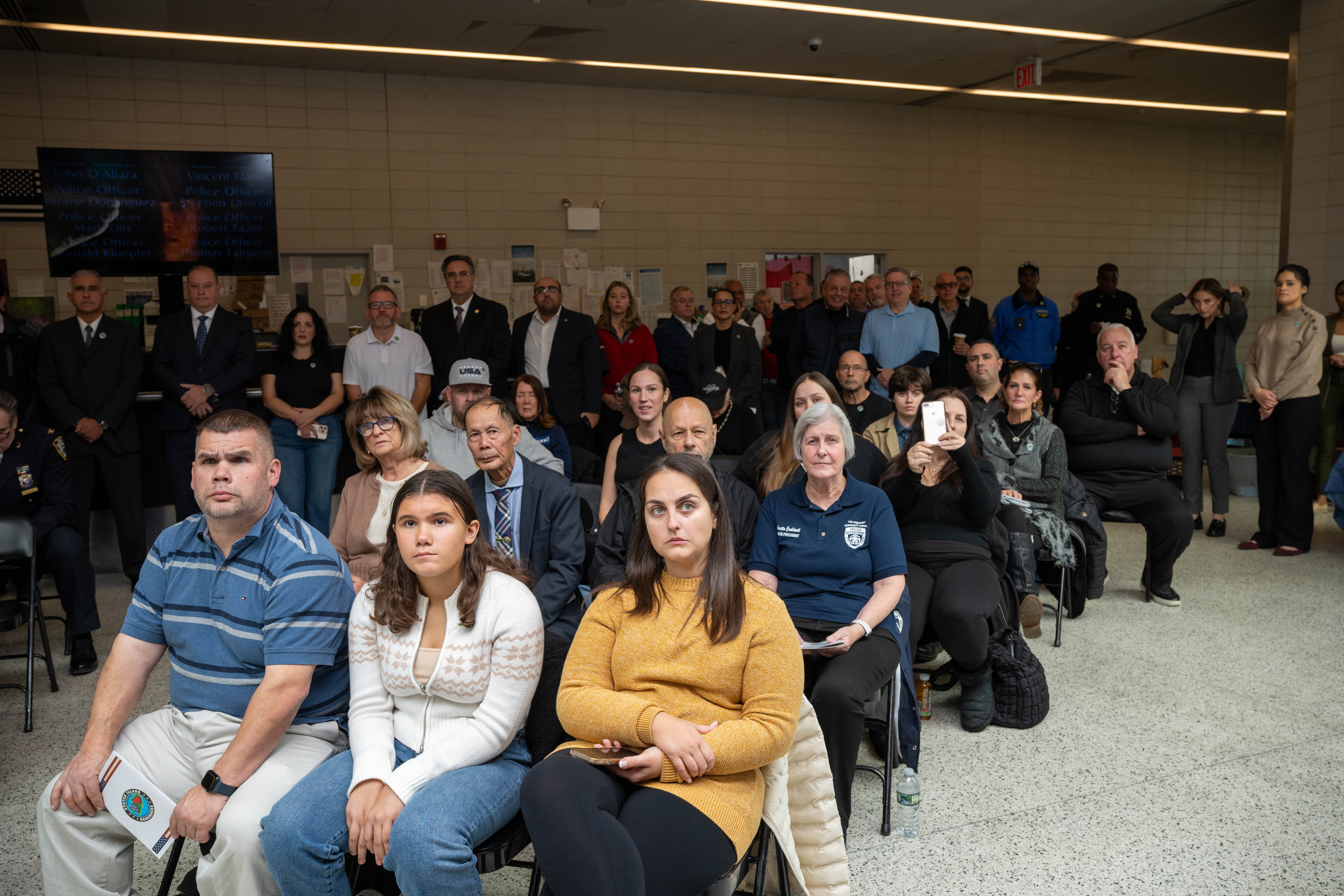 Friends, family, community leaders, elected officials, and fellow NYPD members gather at the 121st Precinct on Saturday, November 15, 2025, in Graniteville for the 10th annual Staten Island Remembers, honoring fallen Staten Islanders who served in the New York Police Department. (Owen Reiter for the Advance/SILive.com)