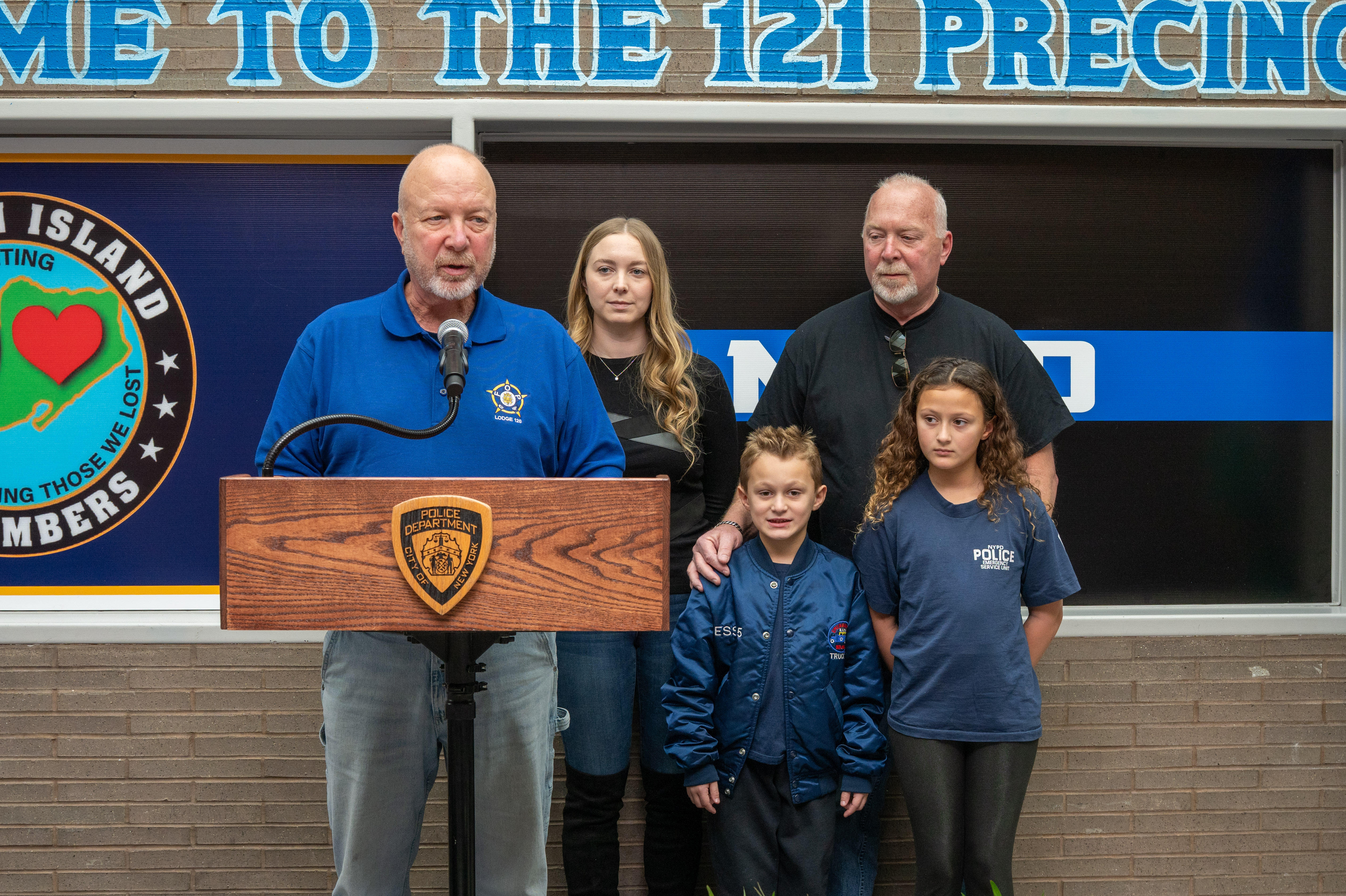 Friends, family, community leaders, elected officials, and fellow NYPD members gather at the 121st Precinct on Saturday, November 15, 2025, in Graniteville for the 10th annual Staten Island Remembers, honoring fallen Staten Islanders who served in the New York Police Department. (Owen Reiter for the Advance/SILive.com)