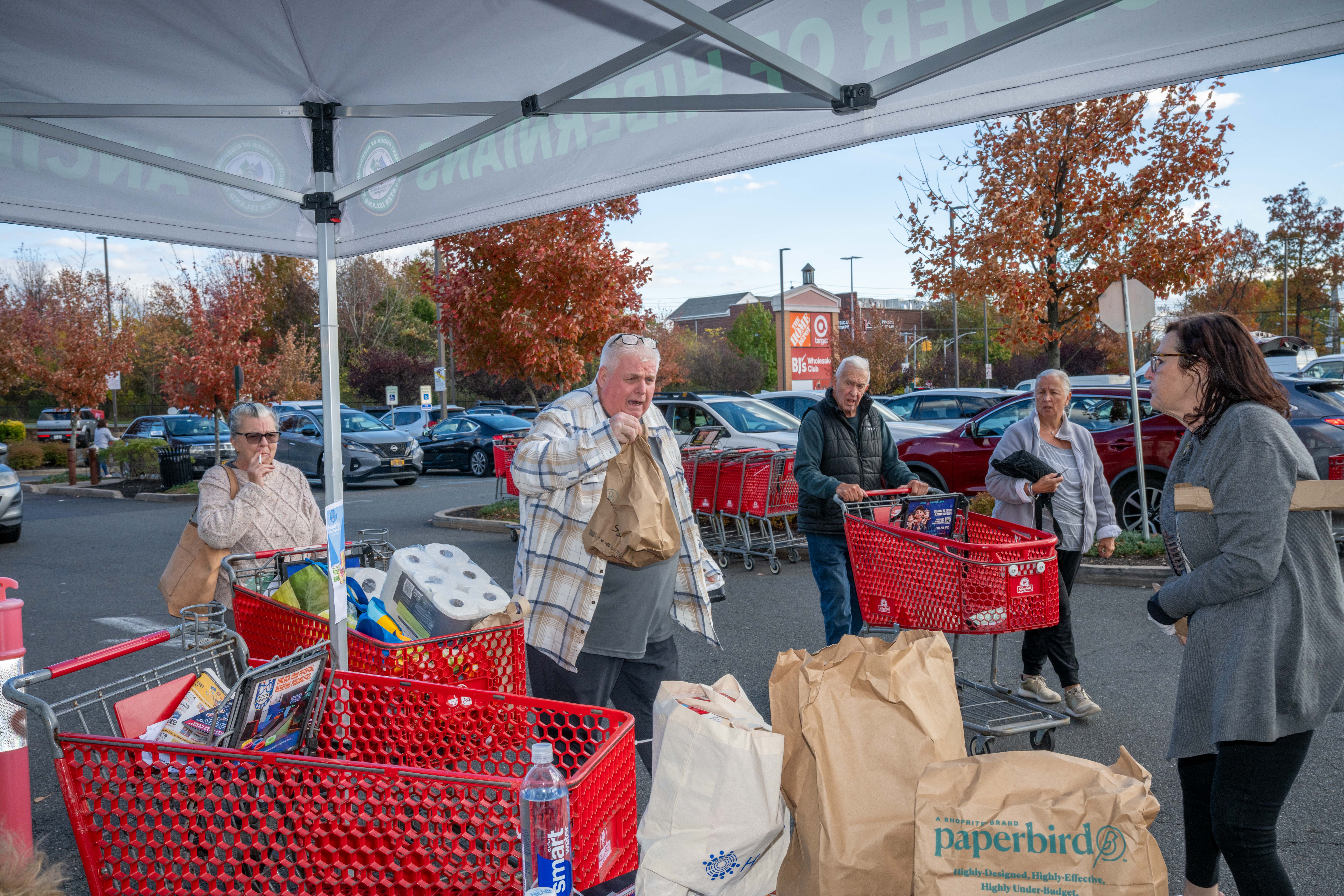 Hundreds of people donate food and/or money to the Ancient Order of Hibernians’ food drive for Blue Star Families on Saturday, November 1, 2025, in Charleston. The proceeds will benefit military families at Fort Wadsworth. (Owen Reiter for the Advance/SILive.com)