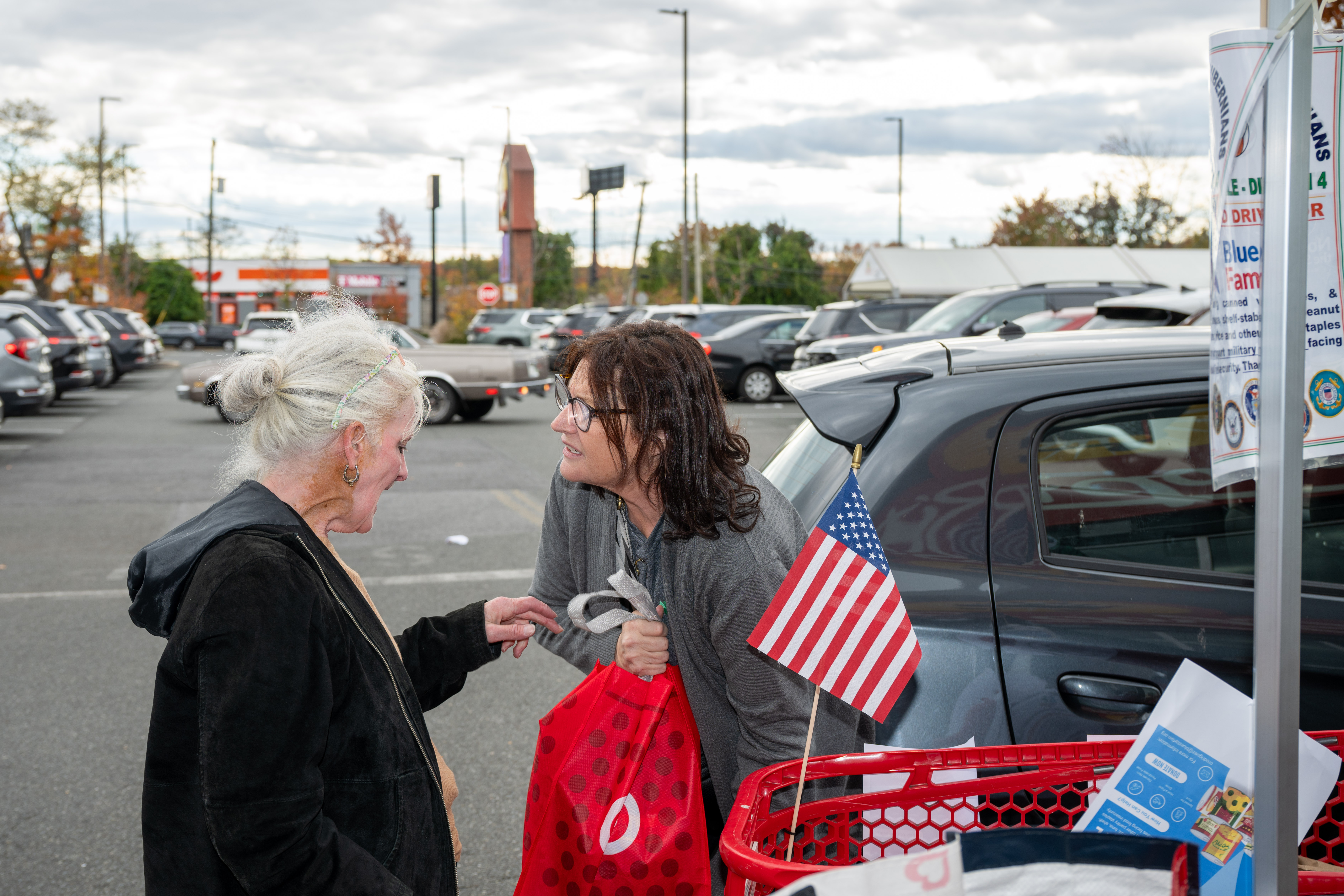 Hundreds of people donate food and/or money to the Ancient Order of Hibernians’ food drive for Blue Star Families on Saturday, November 1, 2025, in Charleston. The proceeds will benefit military families at Fort Wadsworth. (Owen Reiter for the Advance/SILive.com)