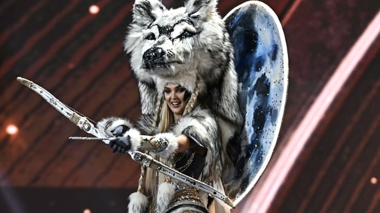 Miss Estonia Brigitta Schaback walks on stage.(AFP)