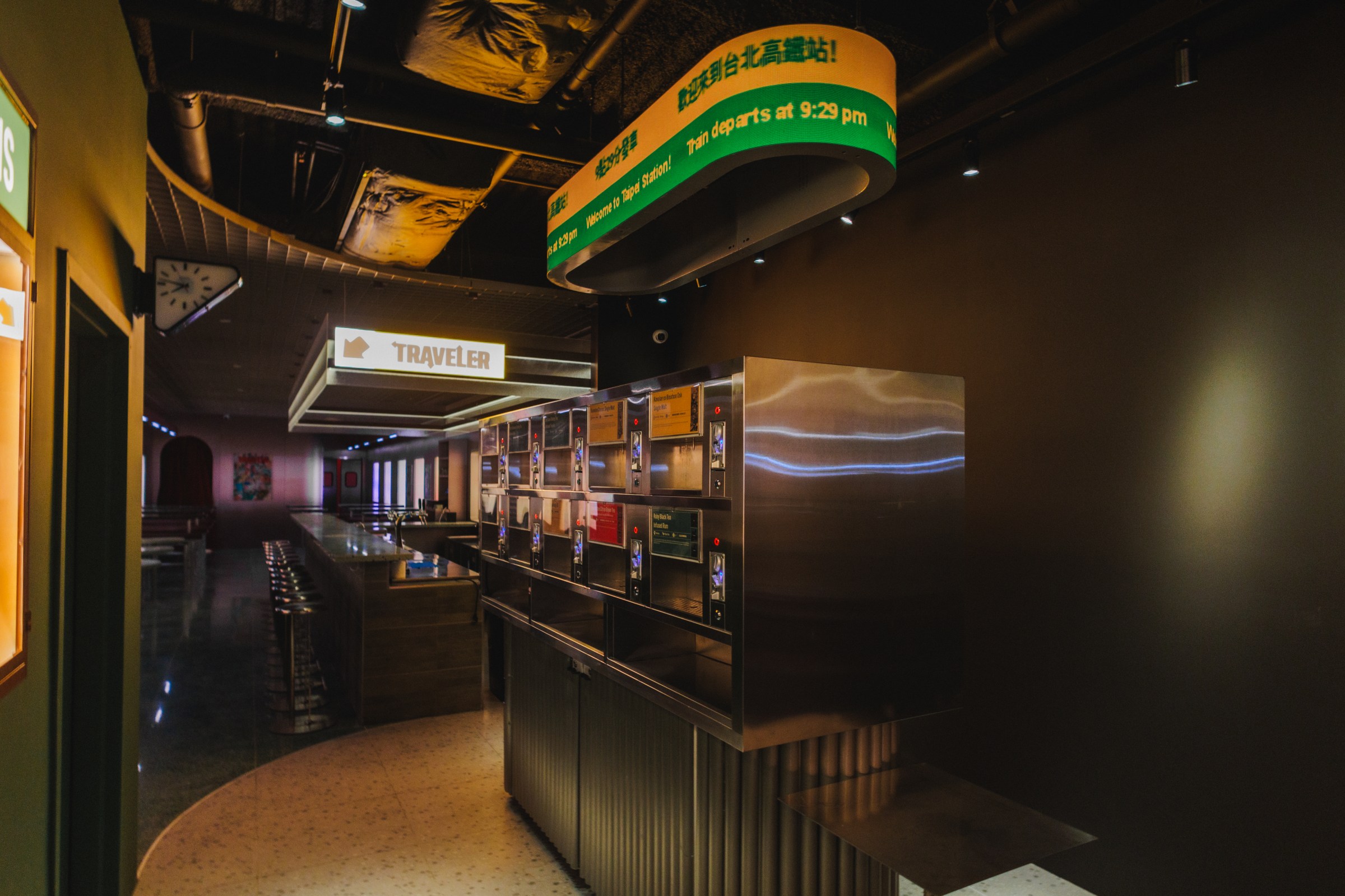 A bar with a vending machine console in the middle.
