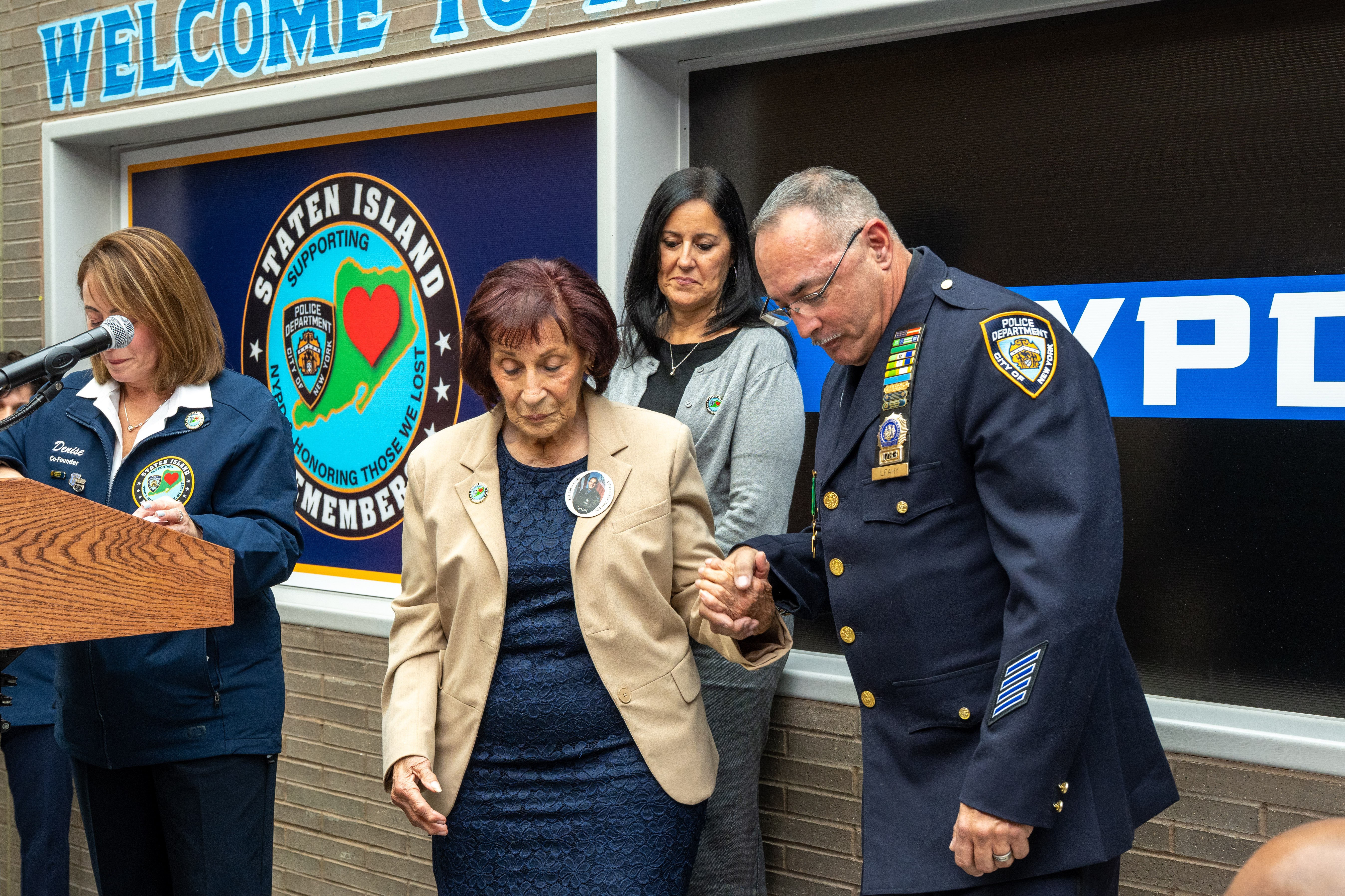 Friends, family, community leaders, elected officials, and fellow NYPD members gather at the 121st Precinct on Saturday, November 15, 2025, in Graniteville for the 10th annual Staten Island Remembers, honoring fallen Staten Islanders who served in the New York Police Department. (Owen Reiter for the Advance/SILive.com)