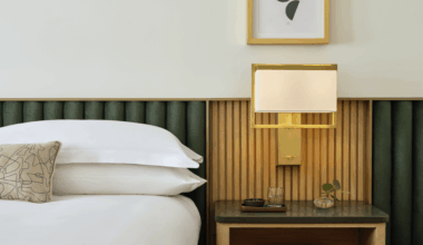 bed and headboard detail in guestroom Kimpton Ashbel New York-Park Avenue