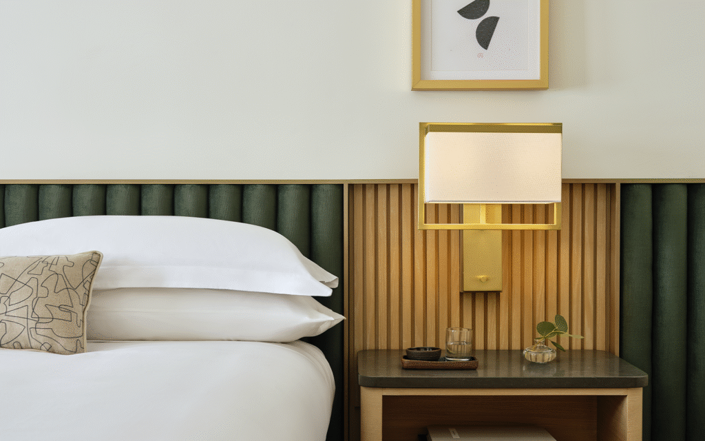 bed and headboard detail in guestroom Kimpton Ashbel New York-Park Avenue