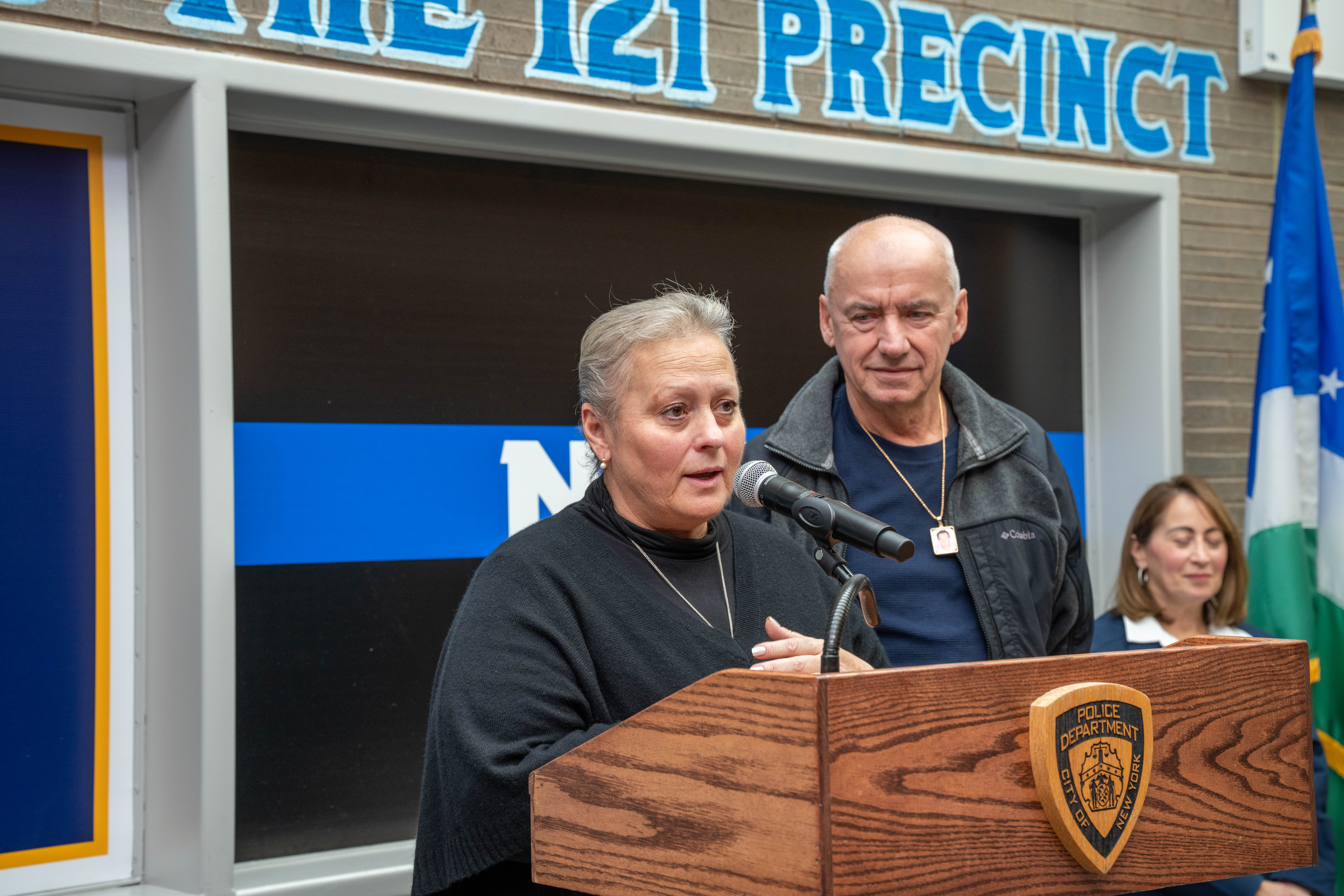 Tatyana and Leonid Timoshenko speak at the 121st Precinct on Saturday, November 15, 2025, in Graniteville for the 10th annual Staten Island Remembers, honoring fallen Staten Islanders who served in the New York Police Department. The Timoshenko’s only child, Detective Russel Timoshenko, was killed in the line of duty. (Owen Reiter for the Advance/SILive.com)