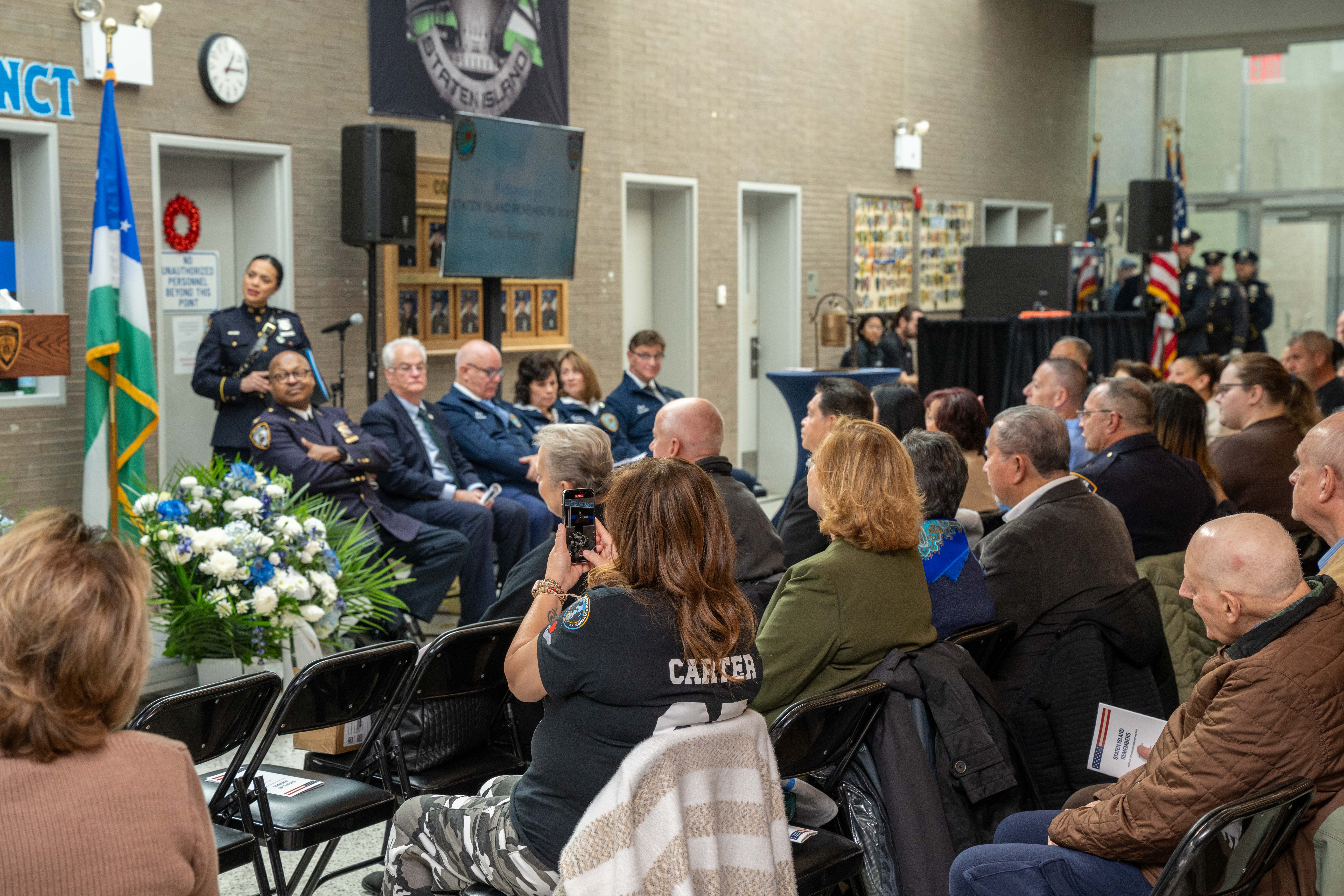 Friends, family, community leaders, elected officials, and fellow NYPD members gather at the 121st Precinct on Saturday, November 15, 2025, in Graniteville for the 10th annual Staten Island Remembers, honoring fallen Staten Islanders who served in the New York Police Department. (Owen Reiter for the Advance/SILive.com)