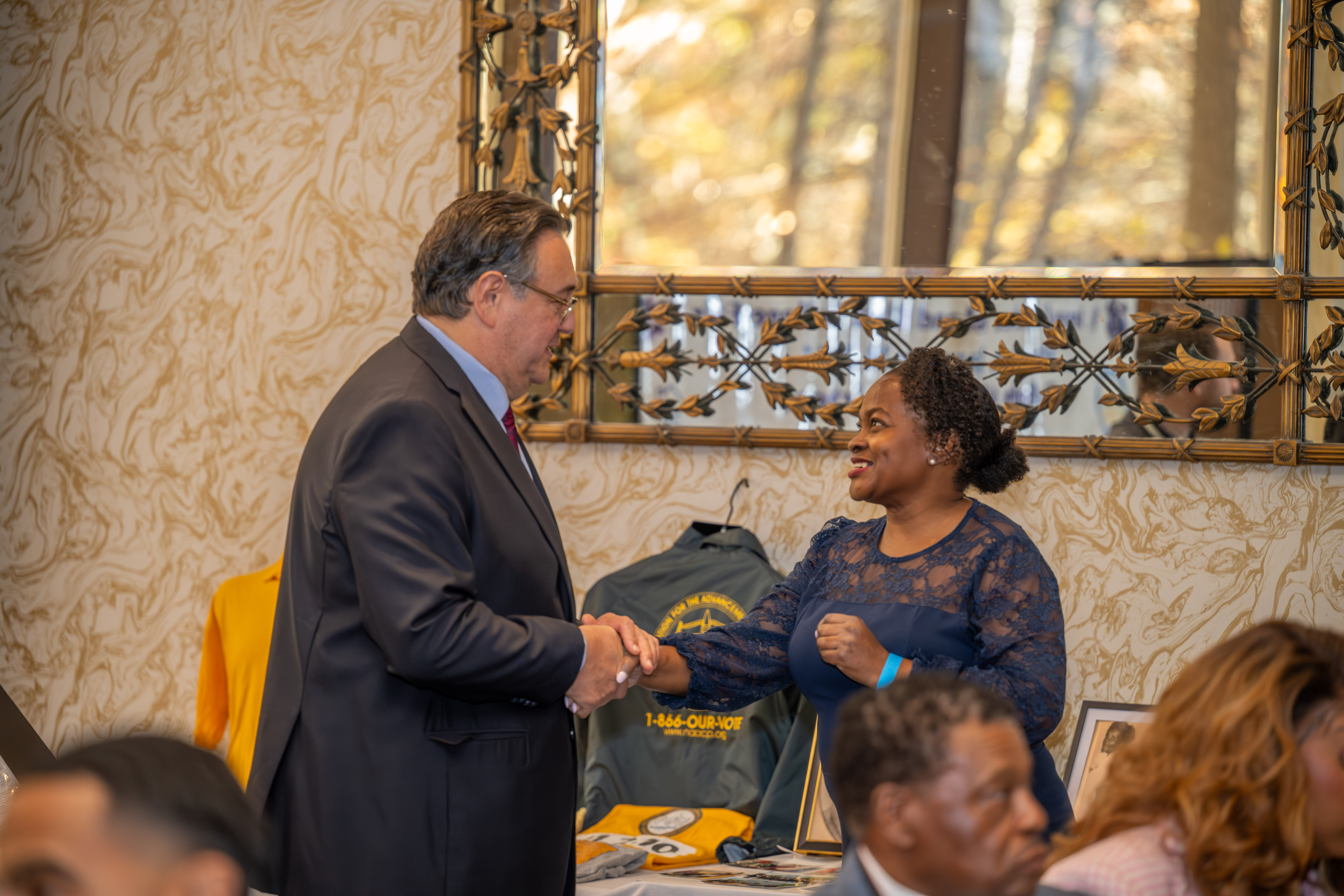 Assemblymember Sam Pirozzolo greets a guest at the Staten Island NAACP’s Freedom Fund Luncheon held at Nicotra’s Ballroom at the Hilton Garden Inn on Saturday, November 8, 2025, in Bloomfield. The milestone event marked 100 years of service to the community. (Owen Reiter for the Advance/SILive.com)