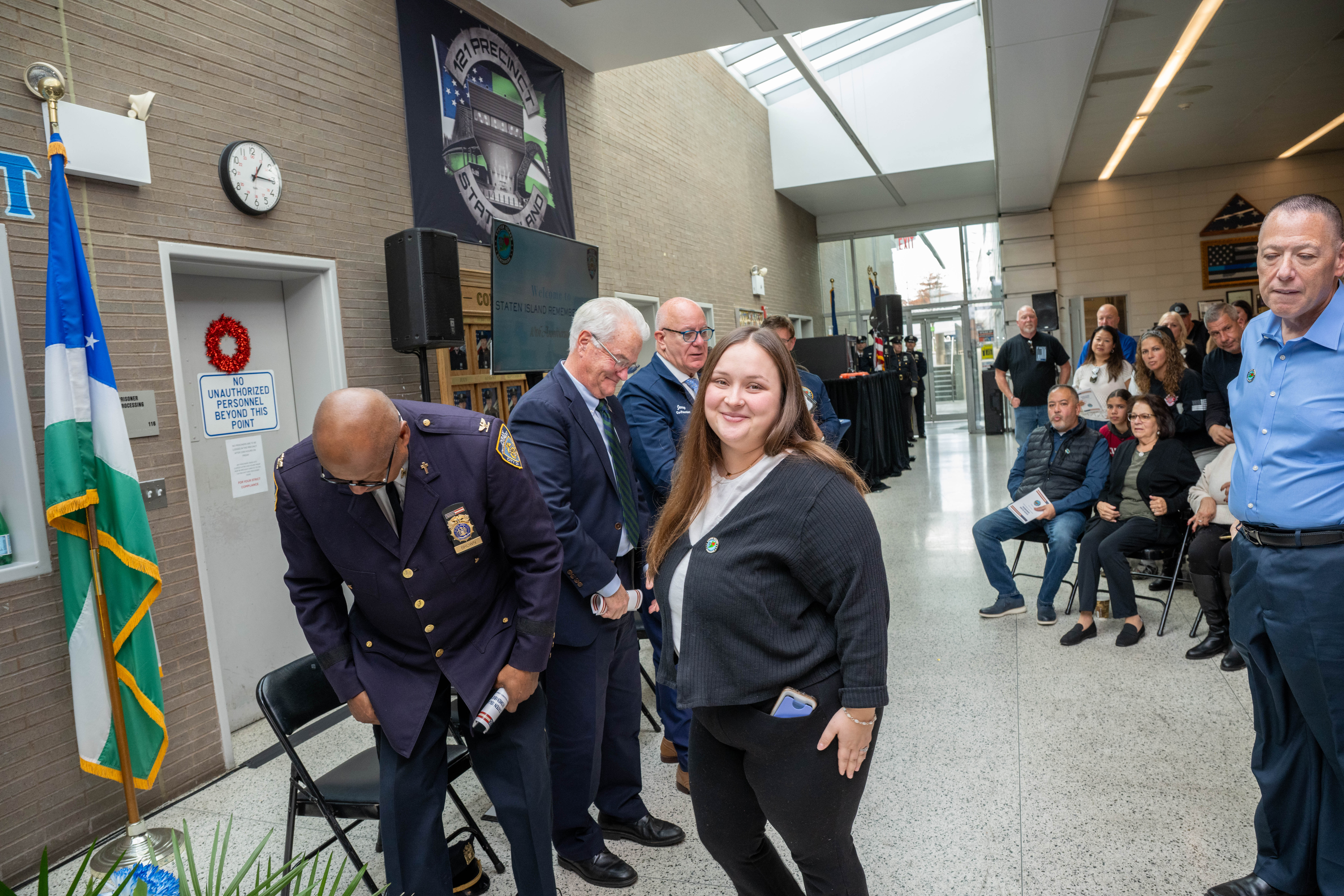 Friends, family, community leaders, elected officials, and fellow NYPD members gather at the 121st Precinct on Saturday, November 15, 2025, in Graniteville for the 10th annual Staten Island Remembers, honoring fallen Staten Islanders who served in the New York Police Department. (Owen Reiter for the Advance/SILive.com)