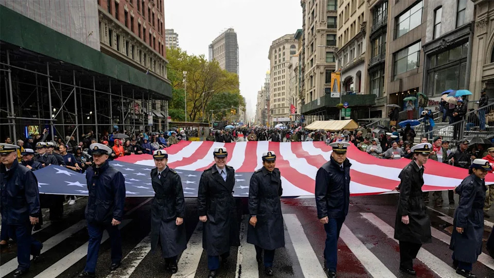 <div>US Navy personnel carry a US flag as they march during the annual Veterans Day Parade in New York on November 11, 2022. <strong>(Photo by ANGELA WEISS / AFP) (Photo by ANGELA WEISS/AFP via Getty Images) </strong></div>