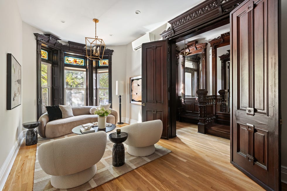 Living room featuring elegant furniture and ornate details.