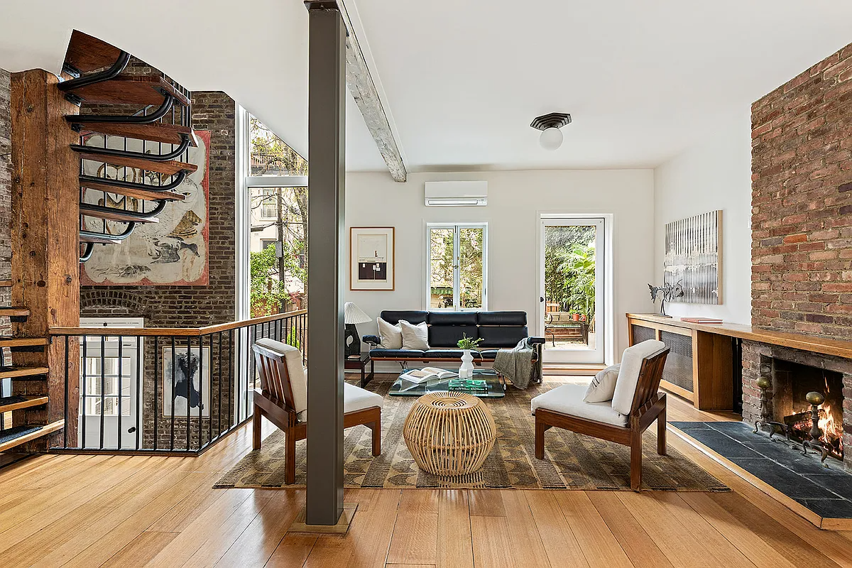 brooklyn - living room with brick fireplace wall