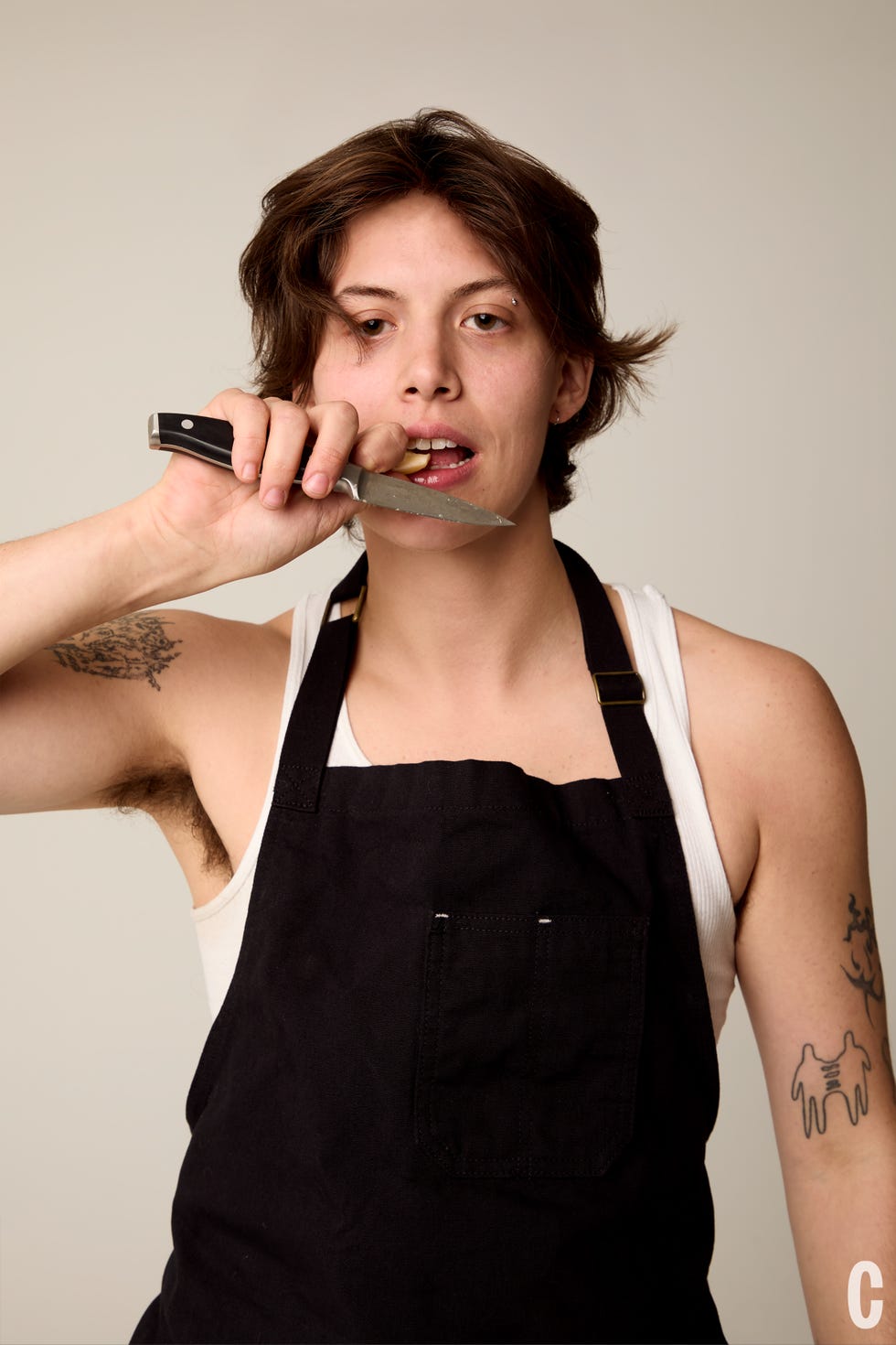 chef eating off knife