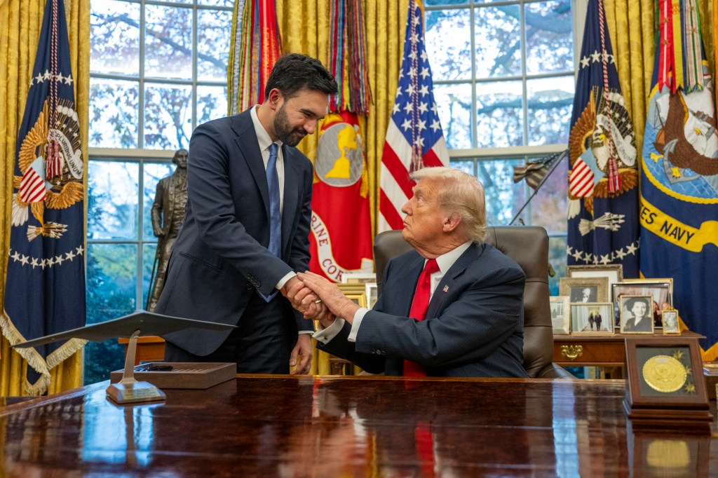 US President Donald Trump shakes hands with New York Mayor-elect Zohran Mamdani in the Oval Office.