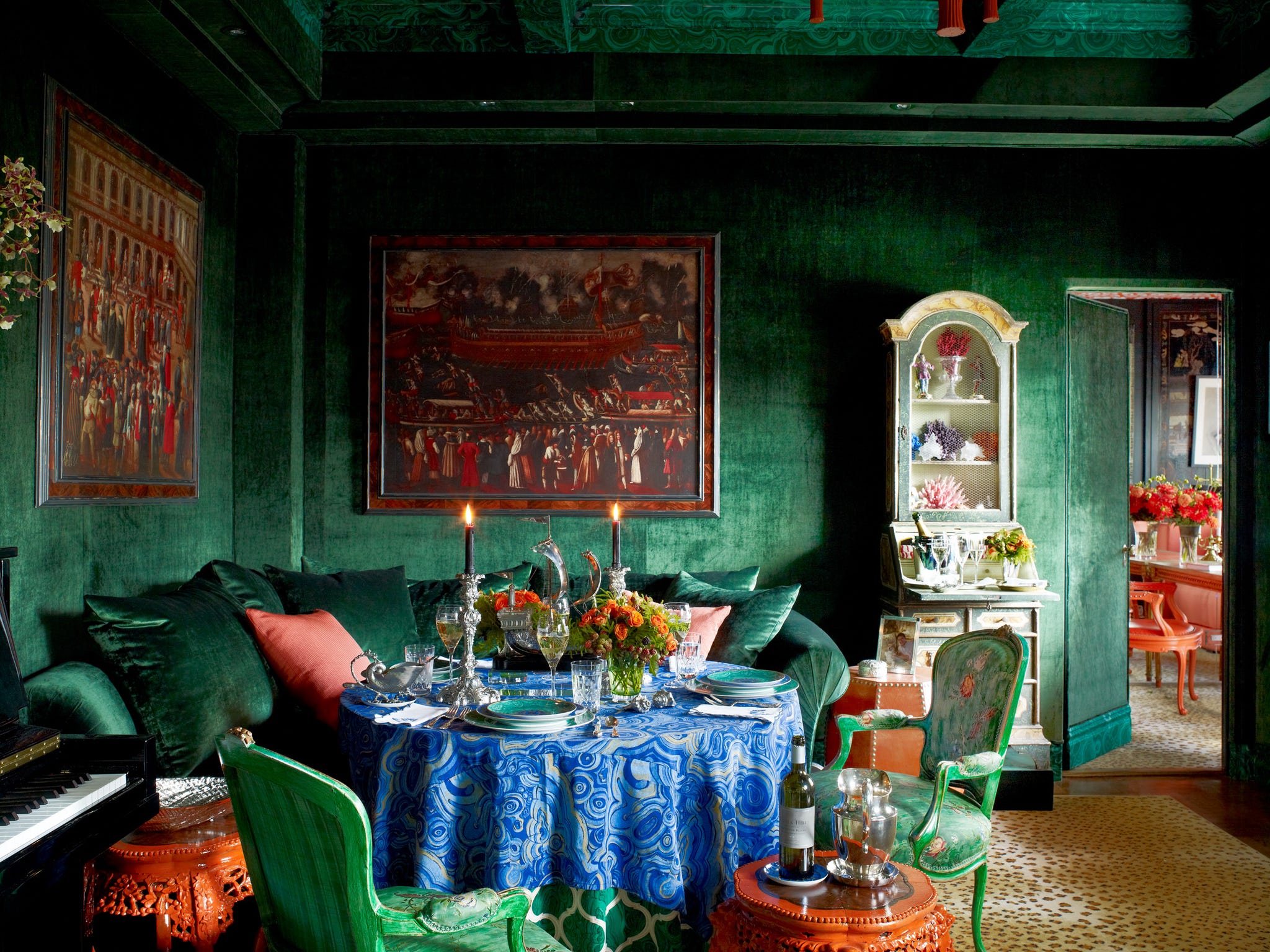drawing room designed by hutton wilkinson in nyc with rich jewel tones set for entertaining at the holidays