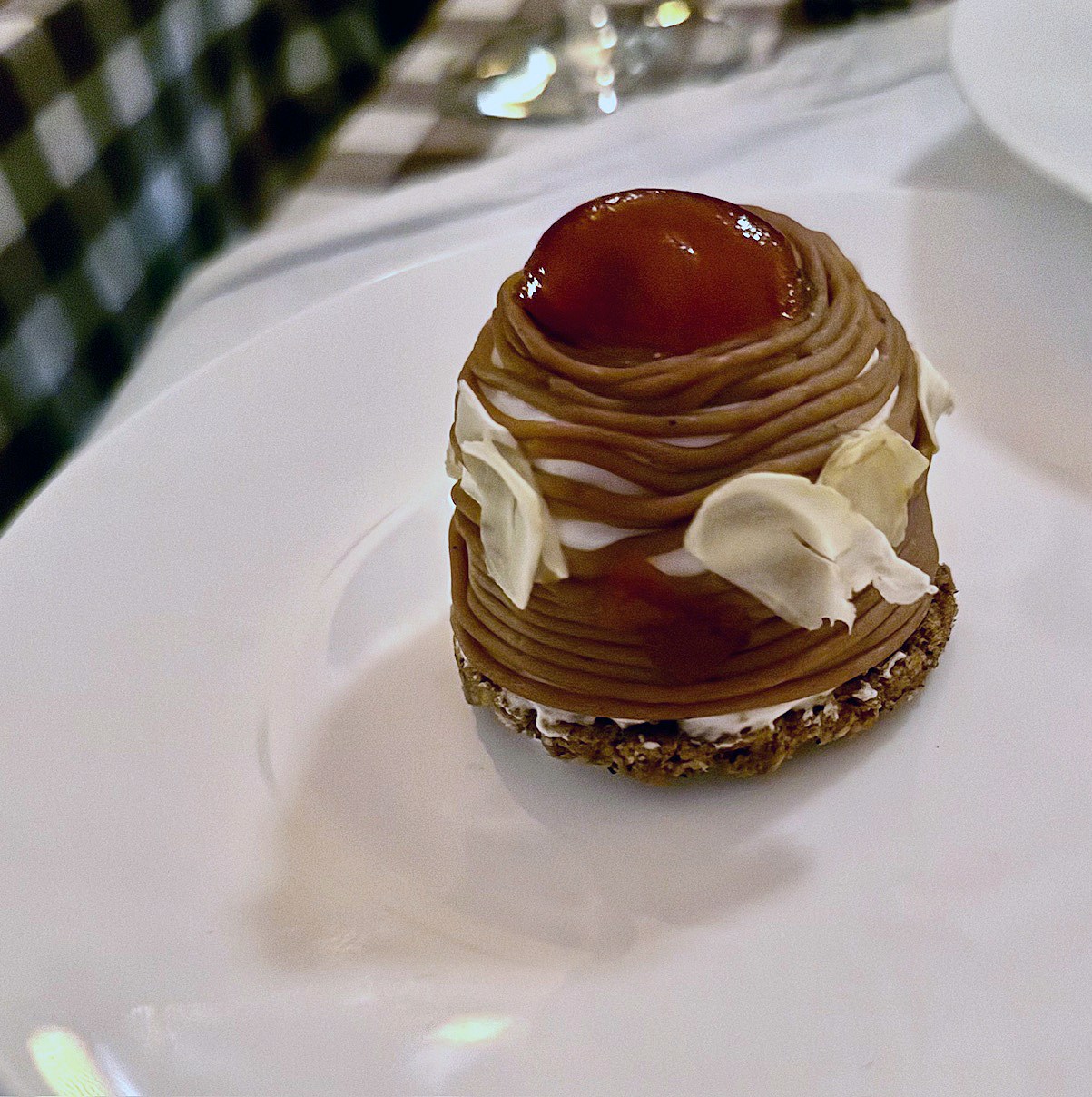 A dessert of a brown mound.