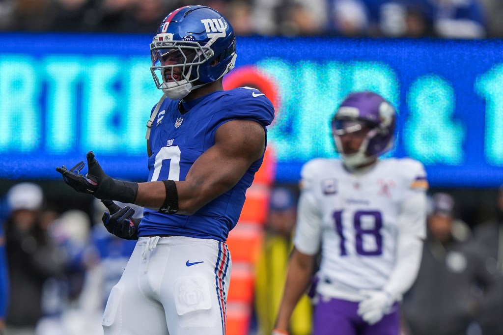 New York Giants outside linebacker Brian Burns (0) reacting during a football game.