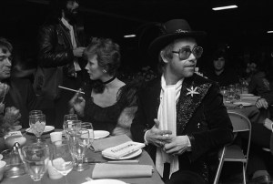 Elton John and friends attend the premiere after party for 'Tommy' Columbia's new rock opera movie directed by Ken Russell in the 57th St. and Sixth Ave. subway station with one hundred policemen stationed near the entrance guarding the invite list on March 18, 1975 in New York...