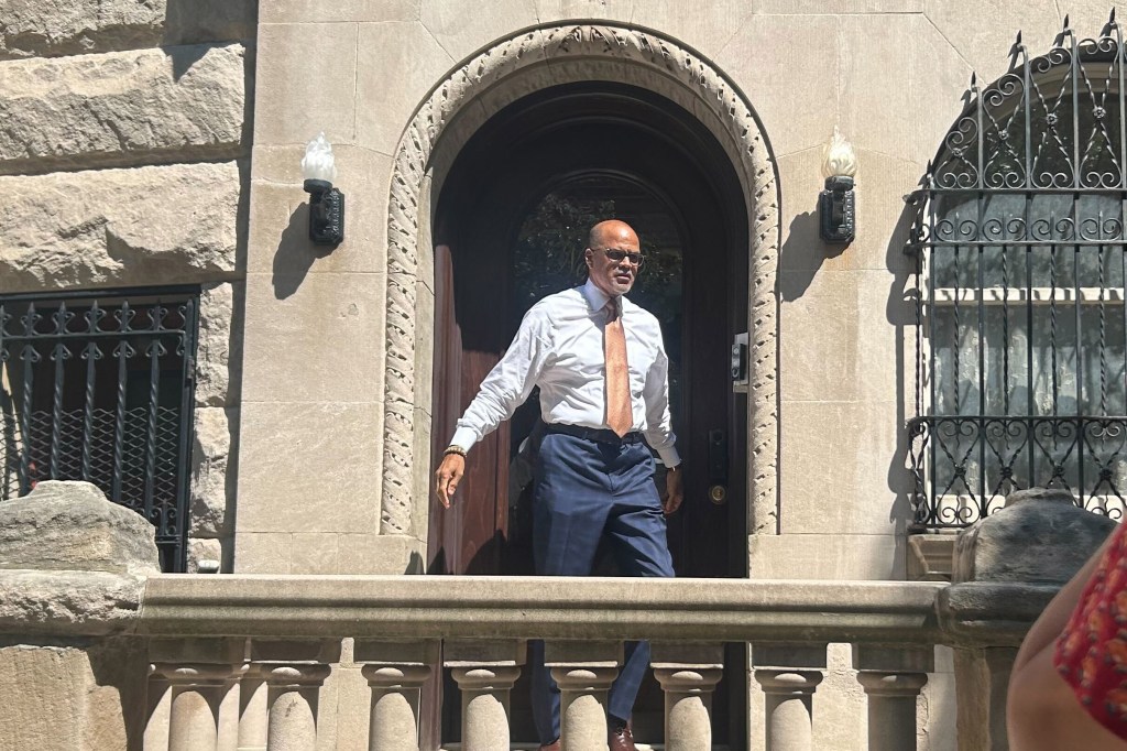 School chancellor David Banks leaves the Hamilton Heights home he shares with First Deputy Mayor Sheena Wright.