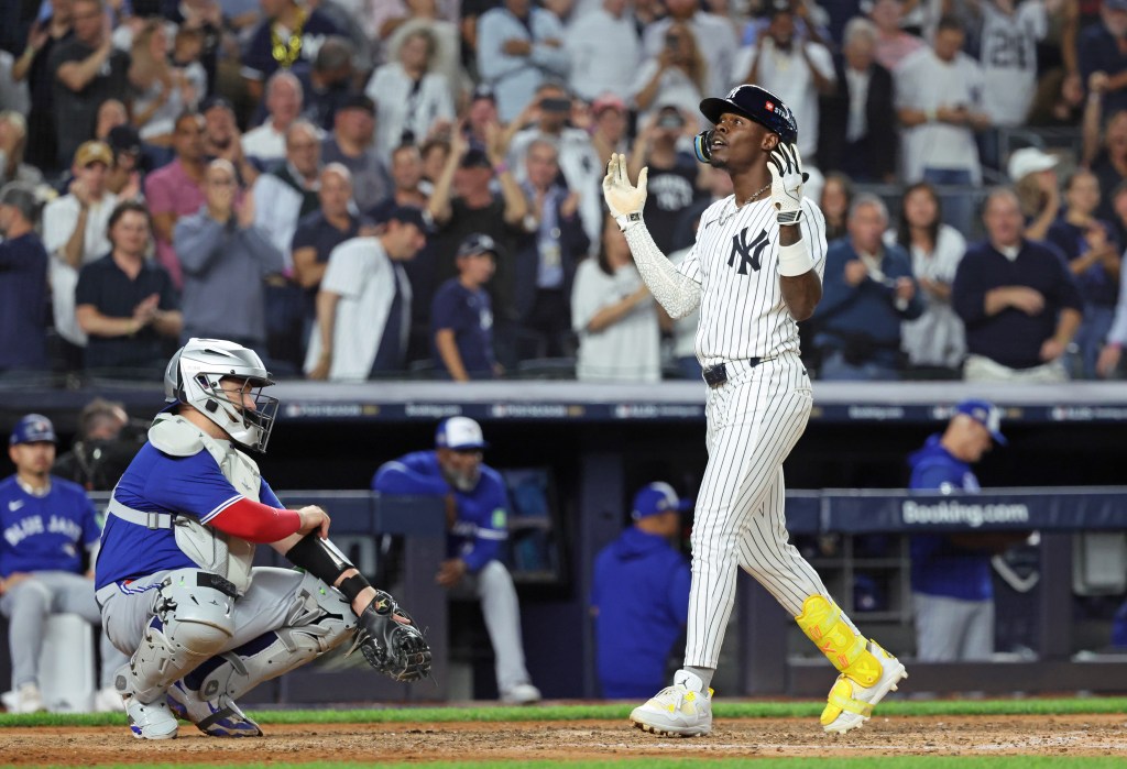 New York Yankees second baseman Jazz Chisholm Jr. #13 reacts as he scores on his solo homer to give the Yankees the lead in the 5th inning.