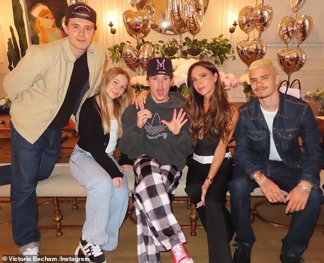 Victoria is pictured with her beloved children last year