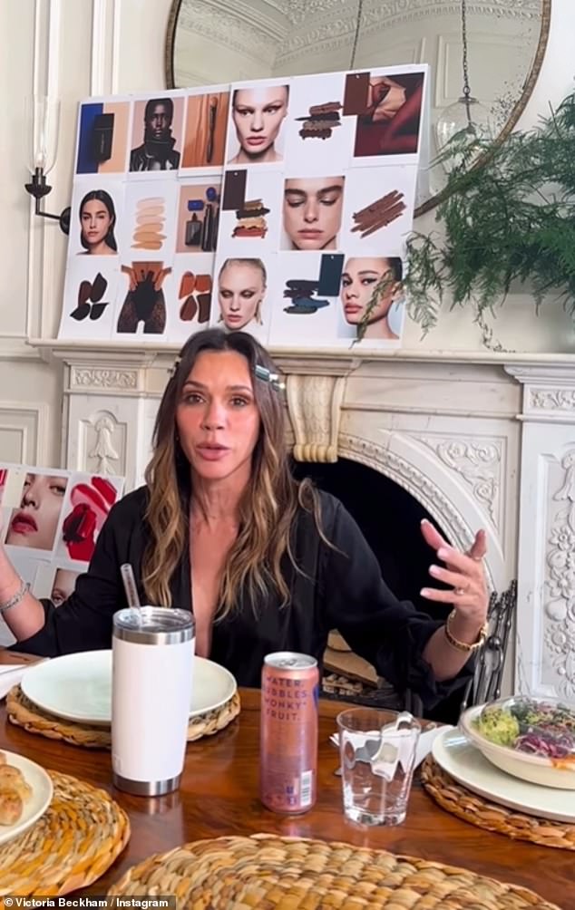 The fashion designer, 51, put on a brave face as she downed a shot with her colleagues on Monday ahead of Christmas - amid the deepening rift with her son