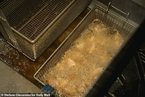 Vitolo deep-fried the squid, but that doesn't mean you need one. Simply use a deep pot or with ample oil