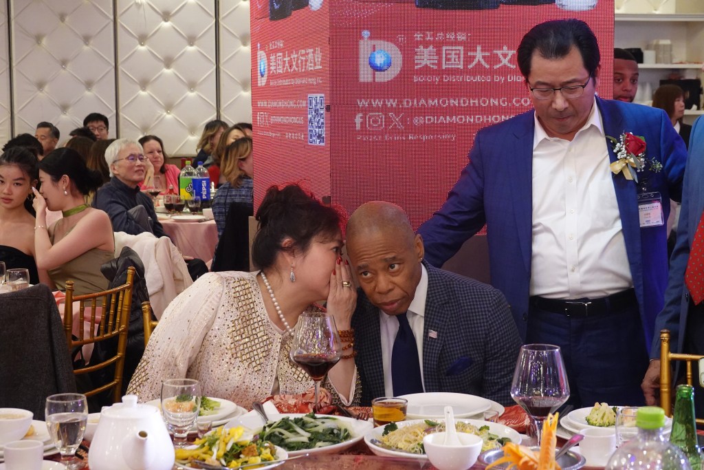 Mayor Eric Adams and Asian affairs advisor Winnie Greco at the Chinese Business Association's Christmas gala at the Royal Queen in Flushing.
