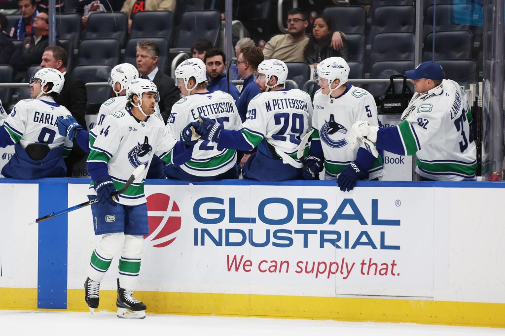 Vancouver Canucks left wing Kiefer Sherwood (44) celebrates his goal during the first period of a game against the New York Islanders at UBS Arena in Elmont, N.Y. on Friday, Dec. 19, 2025.