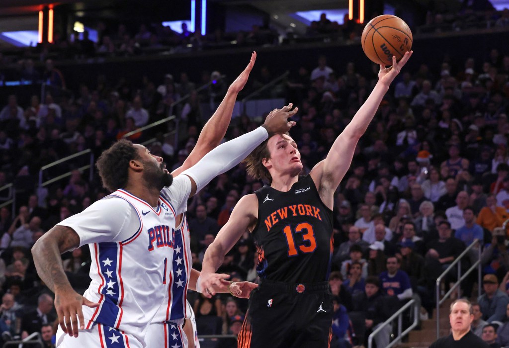  New York Knicks guard Tyler Kolek #13 goes up for a shot during the fourth quarter. The New York Knicks lose to the Philadelphia 76ers.