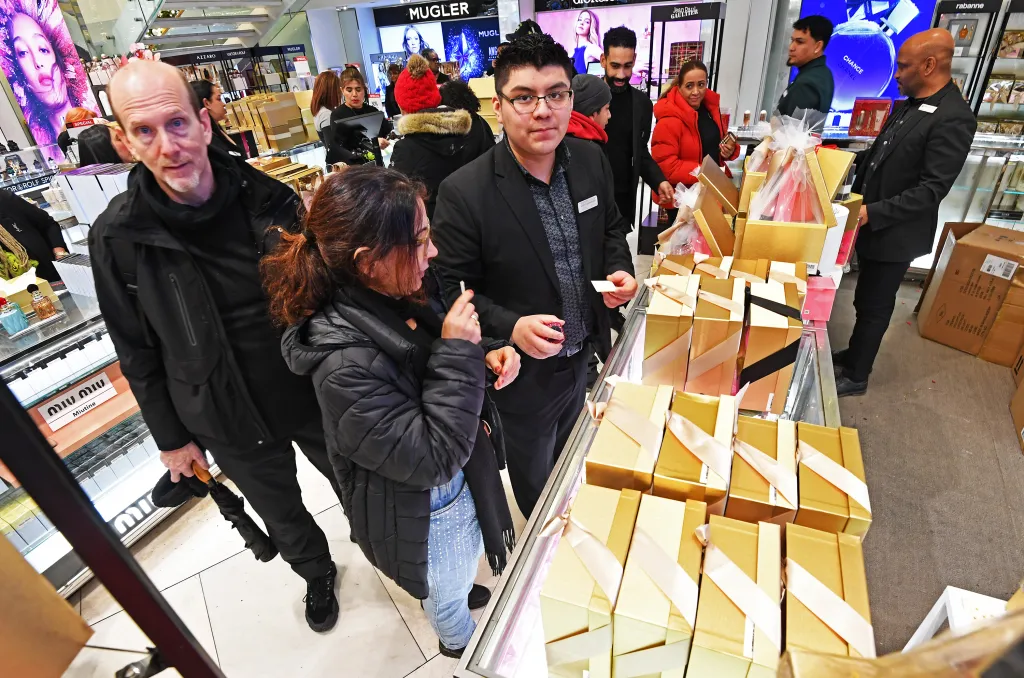 People shopping at Macy's in Herald Square, New York City.