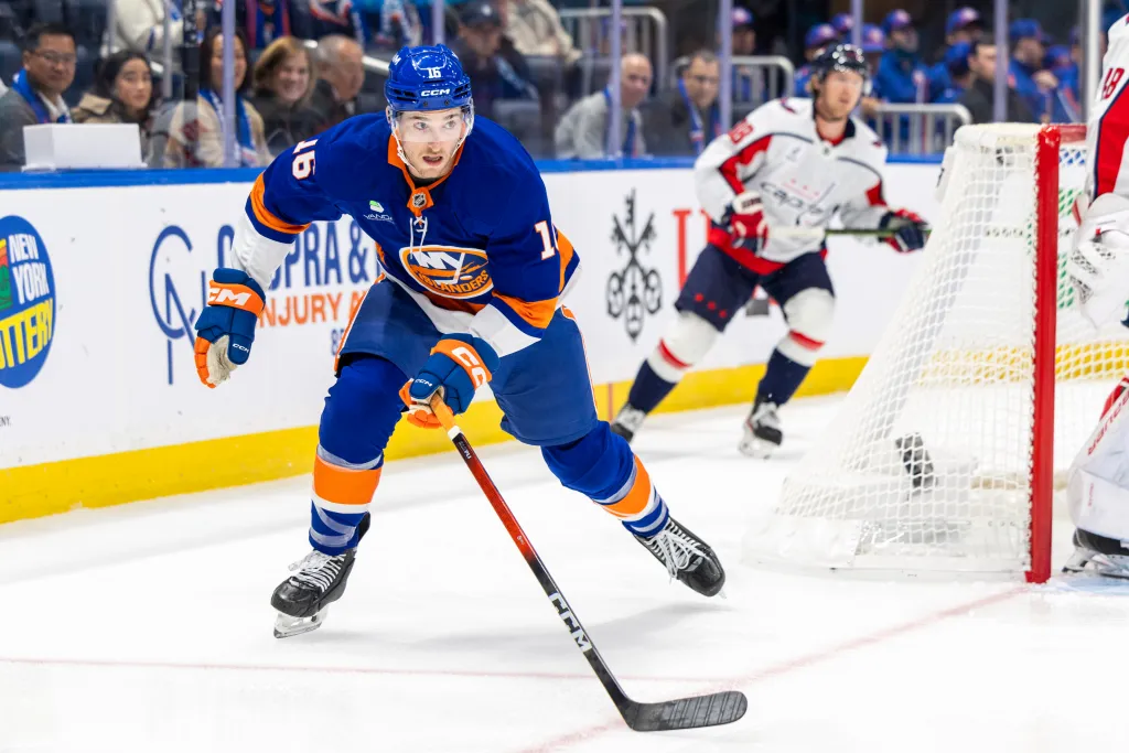 Marc Gatcomb #16 of the New York Islanders skates around the back of the net during the first period at UBS Arena, Saturday, Oct. 11, 2025.