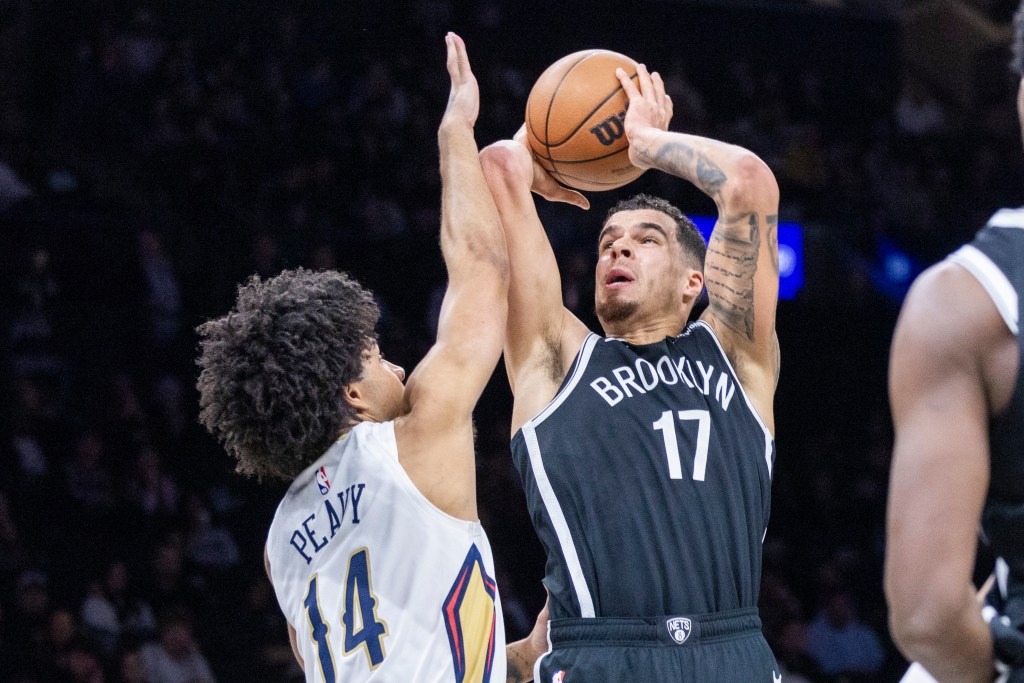 Michael Porter Jr. #17 of the Brooklyn Nets goes up for a shot as Micah Peavy #14 of the New Orleans Pelicans defends during the second half at Barclays Center, Saturday, Dec. 6, 2025, in Brooklyn, NY.
