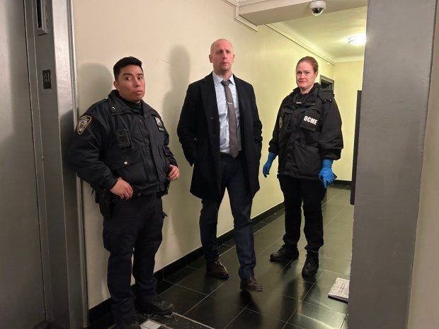 NYPD outside the late actors apartment at 20 Clinton St on the Lower East Side. on Dec. 12, 2025. (Kerry Burke/NYDN) 