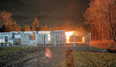 A battery energy storage system burns in Warwick. Officials said the facility, run by Convergent, caught fire on Friday.