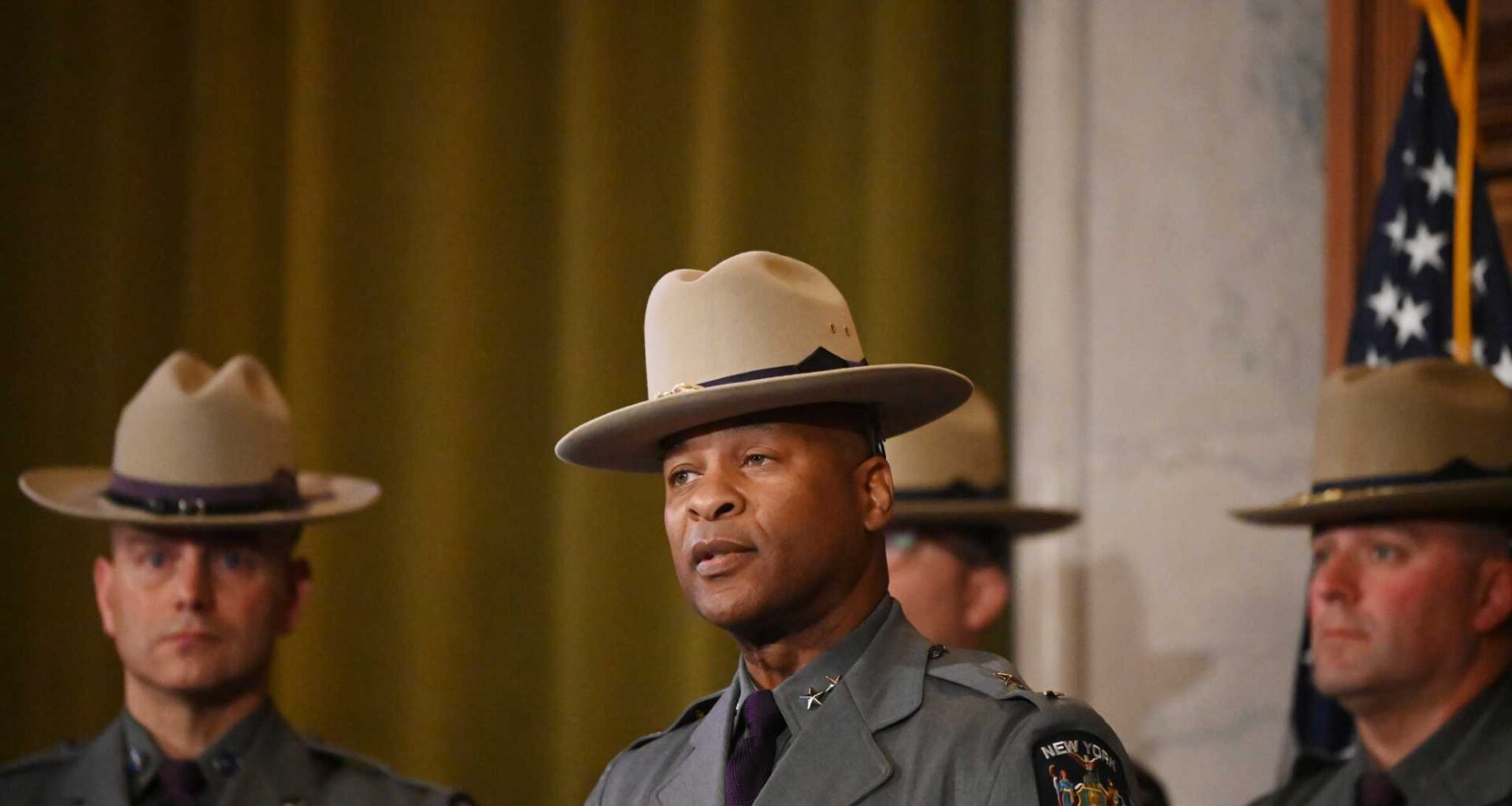 New York State Police Superintendent Steven G. James, center, took over the agency in February 2024 and undertook an immediate leadership shakeup as he sought to remake the agency. His administration has endured its own share of scandals.