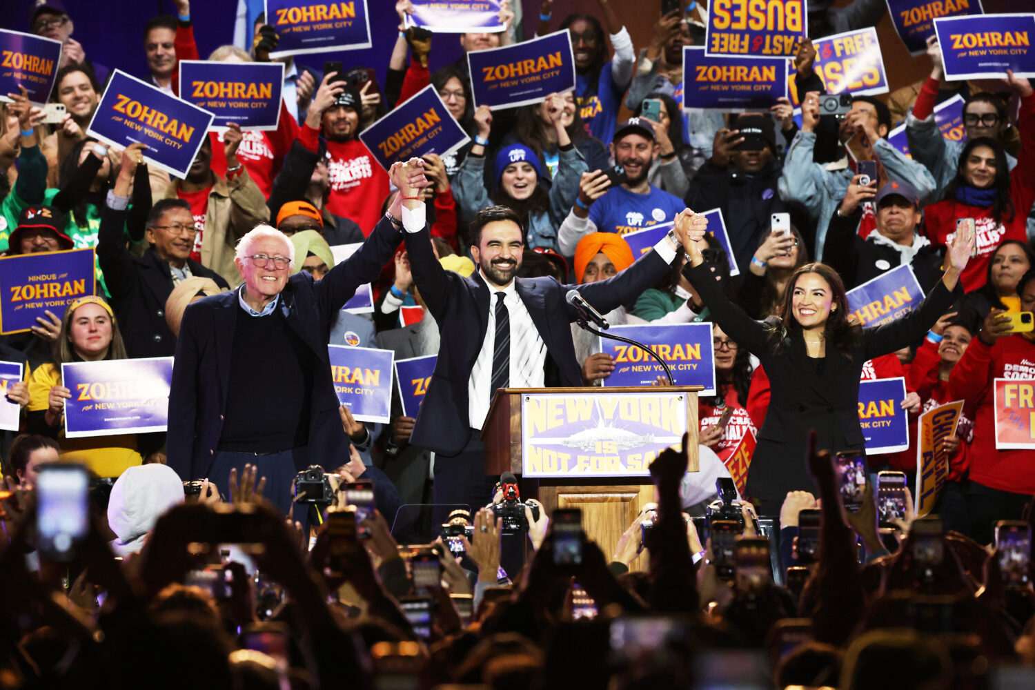 FILE - Sen. Bernie Sanders, I-Vt., left, New York City mayoral candidate Zohran Mamdani, center, an...