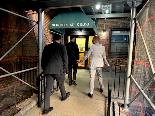 A 76-year-old woman was found dead with multiple injuries inside her apartment at Monroe and Market Sts., a block from the Manhattan Bridge, on Saturday, Dec. 20, 2025. (Rebecca White / New York Daily News)