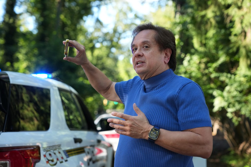 Attorney George Conway livestreams outside former Trump national security adviser John Bolton's home, which FBI agents are searching.
