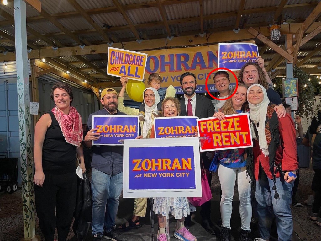 Group photo with Zohran Mamdani (center) and Aber Kawas (far right), with Jack Gross (circled) to Mamdani's right.