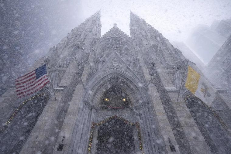A snowy St. Patrick's Cathedral in Manhattan on Gaudete Sunday 2025.