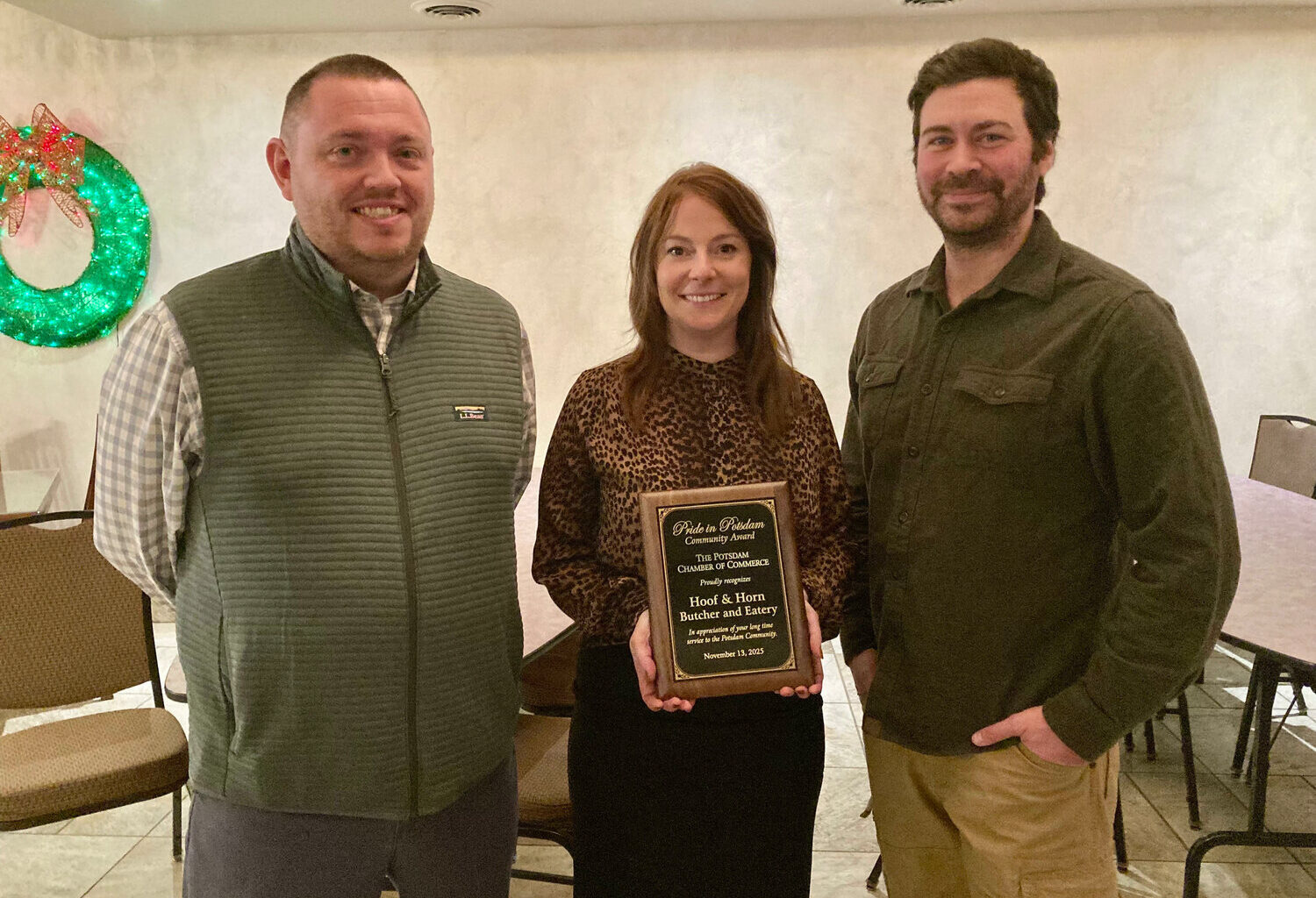 Pictured from left are Albert Hanson, president of the Potsdam Chamber of Commerce Board of Directors; Schwartz; and LeClair.