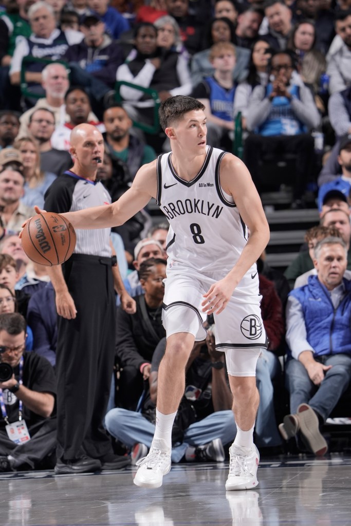 Egor Demin #8 of the Brooklyn Nets dribbles the ball during the game against the Dallas Mavericks on December 12, 2025 at American Airlines Center in Dallas, Texas.