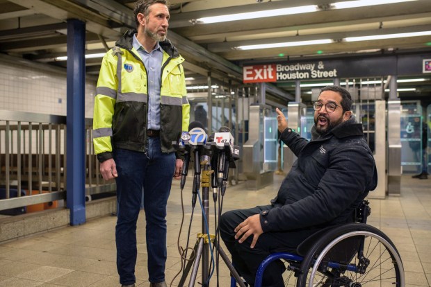 MTA construction boss Jamie Torres-Springer and Chief Accessibility Officer Quemuel Arroyo announce the debut of new subway faregates Friday at the Broadway-Lafayette station of the B, D, F, M and No. 6 train. (Evan Simko-Bednarski / New York Daily News)