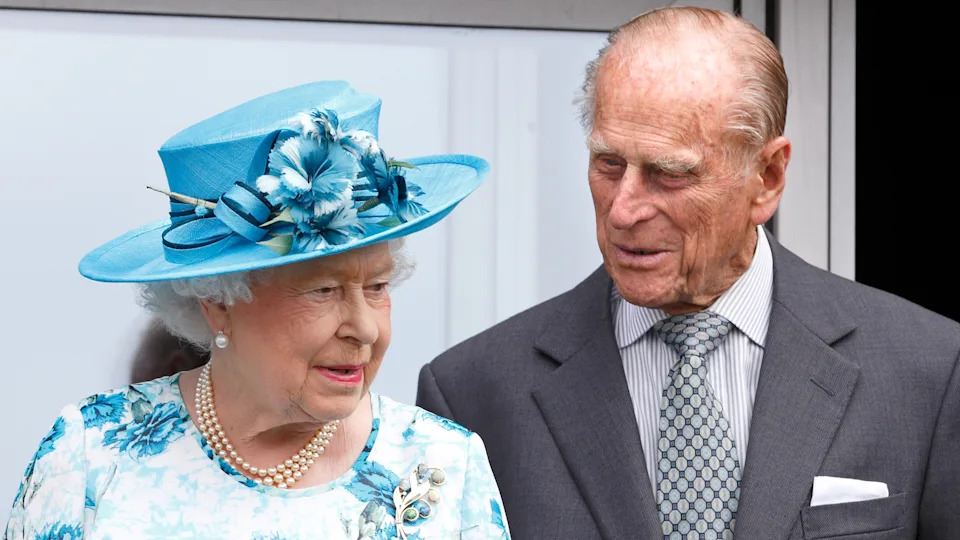 Queen Elizabeth II and Prince Philip, Duke of Edinburgh visit the Broadway Theatre